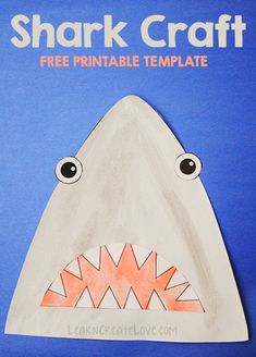 a shark paper craft with the words shark craft free printable template for kids to make