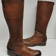 Frye Leather Tall Equestrian Riding Boots Size 7 1/2 B Brown Tall Leather Boots With A Back Zipper And 2 Snap Buttons. Leather Upper, Leather Insole And Leather Sole With Rubber Outsoles. Euc, Normal Signs Of Wear Brown Snip Toe Moto Boots For Riding, Fall Moto Boots With Snip Toe For Riding, Wide Calf Leather Knee-high Boots For Ranch, Classic Fall Moto Boots For Riding, Classic Moto Boots For Fall Riding, Classic Moto Boots For Riding In Fall, Classic Moto Boots For Riding, Riding Boots With Leather Sole And Saddle Shape, Riding Boots With Leather Lining