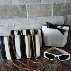 New Medium-Sized Black And White Bags With Gold Chains Straps Trendy White Bag With Chain Strap, Trendy White Shoulder Bag, Elegant Black And White Shoulder Bag For Everyday Use, Chic Black And White Rectangular Shoulder Bag, White Bag With Chain Strap, Chic White Bag With Chain Strap, Chic White Shoulder Bag, White Shoulder Bag With Chain Strap For Summer, Rectangular Bags With Chain Strap For Day Out