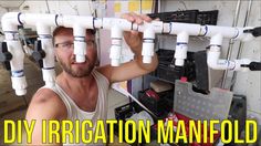 a man is holding up some pipes in front of his face and the words diy irritation manifod on it