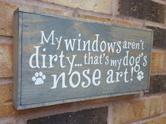 a wooden sign that says, my windows aren't dirty that's my dog's nose art