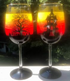 Haunted Halloween hand painted wine glasses. Etsy