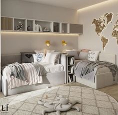 a bedroom with two beds and a world map on the wall