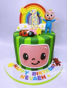 a birthday cake with a cartoon character on top