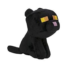 a black cat stuffed animal with yellow eyes