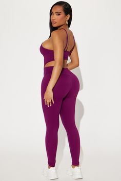 Available In Black And Plum. Active Set Active Top Sleeveless High Neck High Waist Legging Padded Elastic Waistband Super Soft Medium Impact Stretch 75% Nylon 25% Spandex Imported | Stretch It Out Active Set in Plum size Small by Fashion Nova Fitted Nylon Sports Bra With Seamless Design, Sleeveless High Stretch Seamless Activewear, Fitted Seamless Nylon Sports Bra, Sleeveless Elastane Sports Bra For Yoga, Sleeveless Seamless Sports Bra For Pilates, Fitted Sleeveless Sports Bra In Seamless Fabric, Sleeveless Seamless Micro-elastic Activewear, Sleeveless Elastane Sports Bra, Elastane Sports Bra