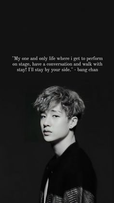 a young man in black and white with a quote on it