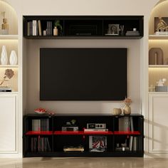 an entertainment center with bookshelves, shelves and a flat screen tv mounted on the wall