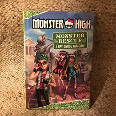 the book monster high monsters rescue is on display