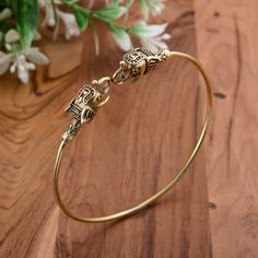 Elephant hand bracelet in gold color 🎉 Hurry! Purchase within the next 24 hours to get your exclusive offer! Apply this promo code[TRIS1234] and get 38% off. IMPORTANT NOTE....👇 you will also get a surprise gift🎁on every purchase. 💥Explore more unique designs in my shop here:  https://www.etsy.com/shop/bohojwellerybazar                                                                                ✨✨You can return item with in 14 days after successful delivery. We offer 100% Money back guara Flexible Bangle Bracelet As Gift, Handmade Gold-tone Bracelet As Gift, Handmade Gold-tone Bracelet Gift, Gold Brass Bracelets For Gifts, Gold-tone Metal Bangle As Gift, Gift Gold-tone Metal Bangle, Gold-tone Metal Bangle Perfect As A Gift, Bohemian Gold Bangle Bracelet As Gift, Adjustable Flexible Bangle For Gifts