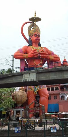 a large statue in the middle of a street