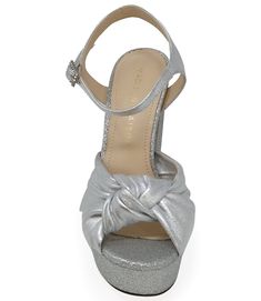 The Madison Maison Marilu Silver Glitter Platform Heel is a stylish and sophisticated shoe, crafted with a durable yet lightweight sole and a shimmering black glitter finish. Perfect for a night out or to add a touch of glamour to a more formal look. Glamorous Glitter Sandals For Gala, Glamorous Glitter Sandals For Formal Occasions, Metallic Round Toe Heels For Gala, Silver Glitter Sandals For Party Season, Party Heels With Heel Strap In Metallic Silver, Glitter Closed Toe Sandals For Evening, Silver Glitter Sandals For Gala, Glamorous Party Heels With Removable Insole, Synthetic Sandals For Party And Holiday