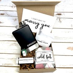 the grooms gift box is filled with personalized items