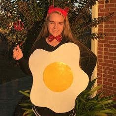 a girl dressed in an egg costume