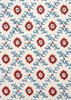 a red, white and blue pattern on fabric