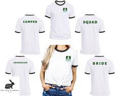 women's white t - shirt with green logo and black trimmings on the front