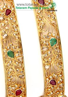 22 Karat Gold Kada with Uncut Diamonds,Ruby & Emerald - 1 Pair
  Gross Gold Weight: 52.750 grams 
  Weight of Uncut Diamonds: 5.74 Carats 
  Weight of Ruby & Emerald : 5.00 Carats 
      
  Note: This item comes with a Screw and hinge so that you can open it up for easy wearing.  
          - 235-GK400 - in 52.750 Grams for USD $5326.24. 
Made in India by Totaram Jewelers Online this product is in Gold - 22 Karat BIS Hallmark 916 KDM Gold  & is an excellent gift for Adult - Women. Sh Traditional Gold Bracelets With Single Cut Diamonds, Traditional Yellow Gold Jeweled Bangle, Traditional Jeweled Yellow Gold Bangle, Traditional Gold Bangle With Single Cut Diamonds, Gold Jewelry With Single Cut Diamonds For Festivals, Gold Kada, Ruby Emerald, Uncut Diamond, Gifts For Adults