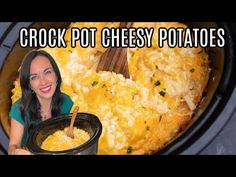 a woman holding a crock pot cheesy potatoes in front of an open crock pot