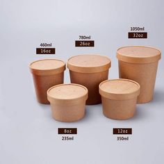 four different sizes and shapes of plastic containers with lids on them, all labeled in brown