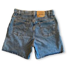 Vintage Levi's shorts. No stretch! Size 14 but fits closer to a 12. flat measured waist is 16 inches. Hips flat measured at 19 inches. Total length of shorts is 18 inches. Classic Jean Shorts With Belt Loops, Retro Jean Shorts With Belt Loops, Vintage Shorts With Belt Loops, Cotton Jean Shorts With Belt Loops, Vintage Cotton Shorts With Belt Loops, Retro Shorts With Belt Loops, Classic High Waist Cotton Shorts, Vintage Cotton Bermuda Shorts, Vintage Bermuda Bottoms With Built-in Shorts