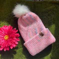 Get a better look at this product via the preview video: https://youtu.be/MC-1417BnwU Introducing "The Spring Chunky Beanie" in Pink - a cozy and double-layered clothing accessory handcrafted by Claire of the Youtube Channel "Woodshed Theory", infused with her love for yarn and passion for fiber crafts. This delightful beanie is the perfect addition to your wardrobe, offering warmth and style for those chilly days. Main Features: Premium Materials: Our beanie is made from 100% acrylic, ensuring a soft and comfortable feel on your head. Custom Cork Tag: Each beanie is thoughtfully adorned with a custom cork tag featuring the signature Woodshed Theory logo, adding a touch of uniqueness. Faux Fur Pom: Pom can be removed and reattached via a button on top of the hat.  Handmade with Care: Clair Playful Pink Crochet Hat, Playful Pink Crochet Hat, One Size Fits Most, Playful Pink Beanie, One Size Fits Most, Pink Beanie Cap (one Size), Playful Pink Beanie (one Size Fits Most), Playful Pink Crochet Hat For Winter, Pink Crochet Hat For Winter, One Size, Pink Crochet Hat For Winter, Pink Crochet Winter Hat One Size