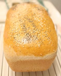 a loaf of bread sitting on top of a cooling rack