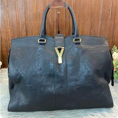 100% Authentic Ysl Cabas Handbag. Black Leather With Gold Hardware. Minimal Signs Of Use, E.G. Scratches, Tiny Dents On Leather. No Rips, Tears, Or Stains Inside And Out Of Handbag. Approximately 16l X 8"W X 11" H (When Bag Is Filled, Measured Longest End). No Dustbag Os Sling. Comes With Entrupy Authentication Card. Priced To Sell Fast. Ysl Cabas Bag, Bags Ysl, Saint Laurent Bags, Yves Saint Laurent Bags, Handbag Black, Gold Hardware, To Sell, Yves Saint Laurent, Saint Laurent