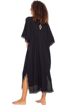 Add a tribal twist to your beach time in this black and gold summer maxi swimwear cover up. Zigzag embroidery adds a spicy accent to this long beach caftan, with a casual vacation vibe and a loose flowy fit that works beautifully on plus sizes. It offers great sun coverage, and is so easy to wear for cruises, lounging, vacation or relaxing days at the beach. Back From Bali is dedicated to creating beautiful, quality clothing with a heart. All of our items are crafted, sewn and painted by hand in