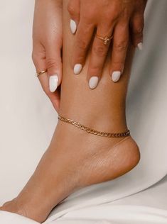 This semi-bold hypoallergenic anklet is the perfect option to wear it all summer long. Dipped in 18k gold over stainless steel, this piece will compliment any outfit. MATERIALS & SIZE Material: 18k stainless steel Size: 8, 8.5, 9 or 9.5 in. chain + 1 in. extender Closure: Toggle clasp JEWELRY CARE Most of our jewelry is tarnish resistant, hypoallergenic, safe for sensitive skin. Handmade with ♡ in New York. - To maintain the beauty of your jewelry, whether it’s stainless steel, gold plated, or g Cute Anklets, Gold Anklet, Gold Dipped, Chain Gold, Cuban Chain, Toggle Clasp, Jewelry Care, Anklets, Sensitive Skin