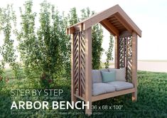 an arbor bench with cushions in the grass