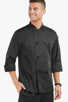 A comfortable classic with a neat secret. This double-breasted Chef Coat has a reversible closure! Splash something on the front? No worries. Just unbutton, flip sides and rebutton. There are certain basics every chef needs. Like a perfect set of knives … and On The Line by Chef Uniforms. So durable – and always a great value • Classic fit • Stand collar • Double breasted • Reversible front closure • Pearlescent plastic buttons • Total of 2 pockets • 1 chest pocket • 1 sleeve pocket • Three-quar Classic Formal Outerwear With 3/4 Sleeves, Workwear Outerwear With Buttons And 3/4 Sleeve, Workwear Outerwear With 3/4 Sleeve And Buttons, 3/4 Sleeve Outerwear With Buttons For Work, Professional Long Sleeve Outerwear With Double Button Closure, 3/4 Sleeve Outerwear With Button Closure For Work, Workwear Outerwear With 3/4 Sleeves And Pockets, Classic Fall Outerwear With 3/4 Sleeve, Professional Long Sleeve Solid Outerwear