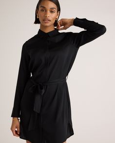 Our silk shirt dress is sleek, streamlined, and pulled together with an effortless tie at the waist. It has button cuffs and hidden button fron details. Versatile style for day to night, meetings to drinks—and washable to top it off. Plus, silk fiber contains 18 kinds of amino acids that make it amazing for skin nourishment, hypo-allergenic, and naturally thermoregulating to help maintain body temperature.  | Quince | Women's 100% Washable Silk Stretch Shirt Dress in Black, Size Medium Chic Collared Shirt Dress For Business, Formal Viscose Shirt Dress For Fall, Sleek Collared Dress For Work, Chic Button-up Silk Shirt Dress, Formal Sleek Shirt Dress For Fall, Sleek Formal Shirt Dress For Fall, Sleek Long Sleeve Shirt Dress, Elegant Tie Waist Shirt Dress For Fall, Elegant Shirt Dress With Tie Waist For Fall