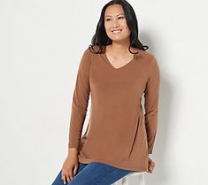 Crafted with smooth-as-butter Liquid Knit®, this tunic top flares to an A-line bottom opening, giving you plenty of movement and swing with every step. Pair it with jeans or leggings, for a daily-wear vibe. From Susan Graver. Relaxed Fit V-neck Tunic For Fall, Casual Stretch Tunic For Fall, Casual Fall Tunic, Casual V-neck Tunic For Fall, Stretch Tunic For Fall, Casual Tunic For Fall Layering, Susan Graver, Knit Tunic, Tunic Length