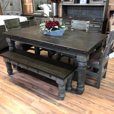 a kitchen table with two benches in front of it