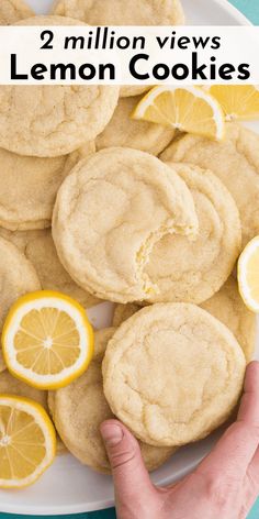 lemon cookies on a white plate with the words 2 million views written in front of them