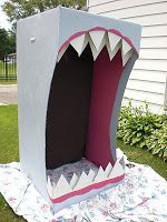 a fake shark's mouth is in the shape of a house