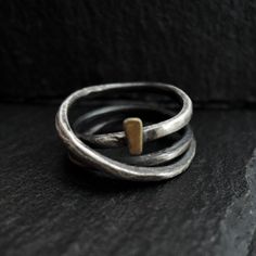 Silver and gold - unisex ring. Silver 925, oxidized. Gold 24k Ring width approx. 13mm (0.5 in). Choose your ring size from the drop down menus. Jewelry is packed in a jewelry box. Silver Brass Ring Jewelry, Unique Silver Stackable Brass Rings, Silver Brass Ring, Silver Polished Brass Rings, Silver Hand Forged Brass Rings, Silver Brass Ring With Polished Finish, Silver Open Ring In Brass, Silver Brass Rings With Polished Finish, Silver Stackable Brass Rings As Gift