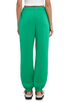 Staying in never looked better and they're just as good when you head out the door; these cozy joggers have you covered when it comes to off-the-clock comfort. Elastic/drawstring waist Side-seam pockets 74% rayon, 14% nylon, 12% spandex Hand wash, dry flat Imported Women's Clothing Green Sweatpants With Elastic Cuffs For Loungewear, Green Joggers For Jogging, Green Joggers With Elastic Cuffs For Loungewear, Green Jogging Sweatpants, Green Sweatpants With Elastic Waistband For Loungewear, Green Elastic Cuffs Joggers For Loungewear, Comfortable Green Sweatpants For Spring, Green Relaxed Fit Joggers With Drawstring, Green Sweatpants With Comfort Waistband