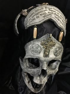 a skull with a cross on it's head