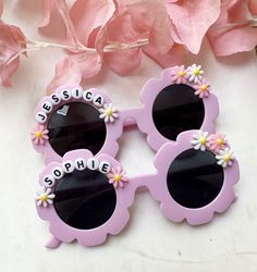 Adorable personalised sunglasses for kids. Choose from Pink/White letters or Black/White letters Personalized Pink Sunglasses For Party, Pink Personalized Sunglasses For Gift, Personalized Pink Sunglasses As A Gift, Personalized Playful Sunglasses For Party, Playful Personalized Sunglasses For Party, Playful Personalized Sunglasses For Parties, Personalized Pink Sunglasses For Beach, Playful Personalized Pink Sunglasses, Playful Party Sunglasses Personalized