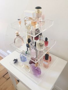 "Display your beautiful perfume collection! The 3 tier acrylic perfume tray is the perfect way to showcase and organize all your stunning perfumes.   Handmade with AA grade new acrylic.  Some assembly is required (screwdriver needed) We are discontinuing the perfume trays. Once they are sold we will not be restocking them.  Dimensions:  Bottom Tray L 11.0 x W 11.0\" (27.9*27.9 cm) Middle Tray L 9.0 x W 9.0\" (22.9*22.9 cm) Top Tray L 7.0 x W 7.0\" (17.8*17.8 cm) Height between Bottom and Middle Baddie Perfume, Perfumes Caravan, Bandeja Perfume, How To Organize Perfumes On Dresser, Perfume Collection Display, Deco Dressing, Profumo Victoria Secret, Koleksi Parfum, Perfume Holder