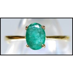 Our jewelry is entirely handmade in our Thailand studio. We focus on bringing creative and symbolic design to fine jewelry crafted in precious metal and set with superior quality gemstones and diamonds. For more Emerald Rings, click here: https://www.etsy.com/shop/BKGjewels?section_id=18901603 Ring information Metal: Yellow Gold 18 Karat Gold Weight: 2.10 grams Size: 7 (US)  N (UK) Appraisal Value: $1550 Emerald information: Shape or Cut: Oval Quantity: 1 Stones Total Weight: 0.78 carats (100% Genuine Natural) Clarity: Eye very clean Color: Green FEATURES - This item can be made with a variety of gemstones or stone sizes. Please email me for information. - The diamond, gemstones and gold are genuine and have been hand selected and inspected by jewelry specialists. - All images we take a pi Exquisite Oval Emerald Ring, Elegant Oval Solitaire Gemstone, Oval Emerald Gemstone With Center Stone, Gia Certified Oval Emerald Gemstone, Gia Certified Oval Emerald, Modern Round Emerald Ring With Center Stone, Modern Emerald Jewelry With Center Stone, Exquisite 14k Gold Emerald Ring, Luxury Solitaire Jewelry For May Birthstone