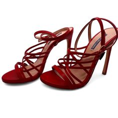 Elevate Your Style With These Stunning Stuart Weitzman Spotlight Stiletto Heels In Vibrant Red Leather. Designed To Captivate Attention, These Elegant Heels Feature A Chic Strappy Design That Accentuates Your Feet With Every Step. With A Size 10 Fit That Feels More Like A 9.5, They Offer Both Comfort And Allure. Worn Just Once, These Beautiful Shoes Are In Pristine Condition, Ready To Add A Touch Of Glamour To Your Wardrobe. Elegant Red Sandals For Formal Occasions, Elegant Red Sandals For Party, Formal Sandals With Red Sole And Almond Toe, Elegant Sandals With Red Sole For Evening, Elegant High Heel Sandals With Red Sole, Elegant Red Sandals With 4-inch Heel, Elegant Sandals With Red Sole For Formal Occasions, Elegant Evening Sandals With Red Sole, Formal Almond Toe Sandals With Red Sole