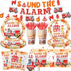 a firetruck themed birthday party set with red and orange decorations, plates, napkins, cups, and other items