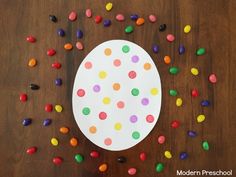 a paper plate that has some candy on it and sprinkles around it