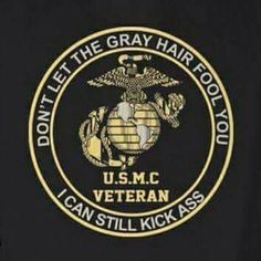 the u s m c veteran emblem is shown on a t - shirt that says don't let the gray hair fool you