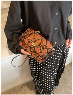 DETAILS Snake print Locks Rectangular:3.9'' W x7.1" H x 11" L Round:3.5''W x 5.9" H x 7.1" L Orange Rectangular Shoulder Bag For Fall, Rectangular Mobile Phone Box Bag For Fall, Rectangular Phone Bag For Fall Travel, Rectangular Phone Bag For Travel In Fall, Rectangular Fall Phone Bag With Cell Phone Pocket, Rectangular Travel Phone Bag For Fall, Rectangular Fall Travel Phone Bag, Trendy Rectangular Phone Bag For Fall, Orange Rectangular Shoulder Bag With Mobile Phone Pocket