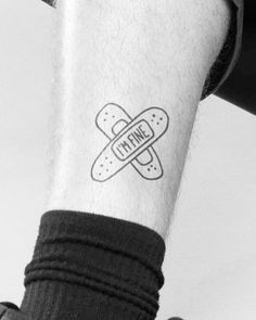 a man with a tattoo on his arm that says imagine in the middle of it