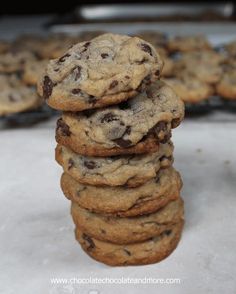 chocolate chip cookies stacked on top of each other