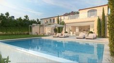 a large swimming pool in front of a house